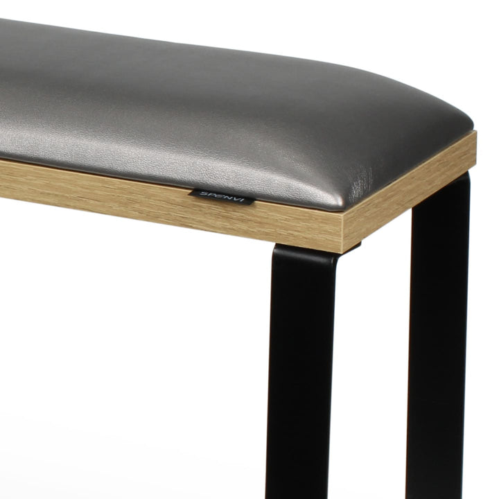 Zbliżenie podpórki do pedicure SPENVI Loft Graphite z poduszką z ekoskóry, podstawą w wykończeniu naturalnego drewna i stabilną metalową konstrukcją. #kolor_graphite