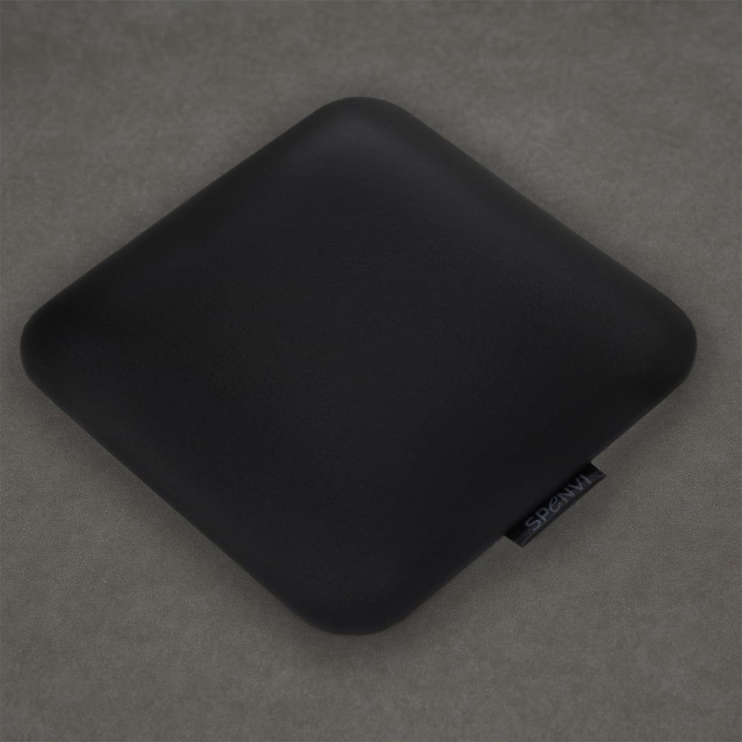 Poduszka pod łokieć do manicure SPENVI Mini czarna z ekoskóry na szarym tle do profesjonalnego stanowiska manicure. #kolor_black