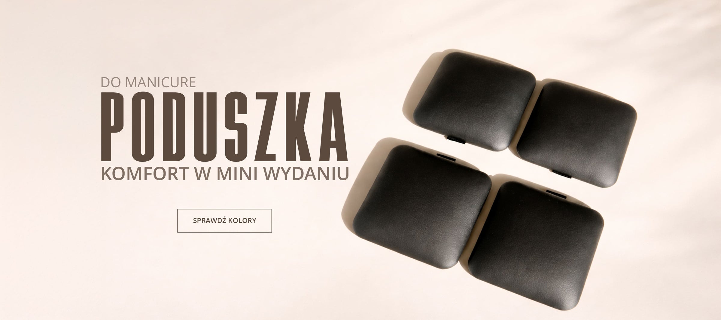 Cztery czarne poduszki pod łokieć Mini do manicure na jasnym tle